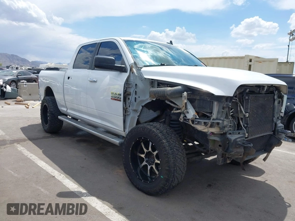 2017 Ram 2500 SLT with VIN 3C6UR5DL8HG551588, listed as a IAAI auction lot 42216223 with 125,891 mi miles and . Bid and sale history available at DreamBid. Image 1.