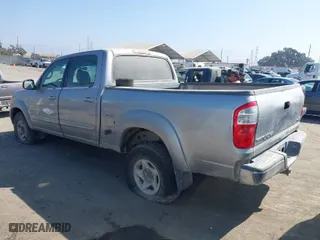 2005 Toyota Tundra SR5 with VIN 5TBET341X5S464119, listed as a IAAI auction lot 40121832 with 185,454 mi miles. Bid and sale history available at carsss.com. Image 3.