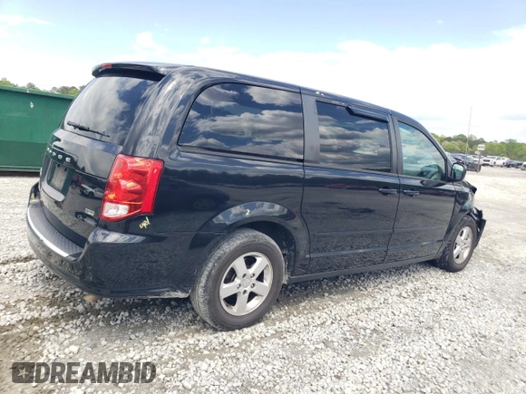 2013 Dodge Grand Caravan SXT with VIN 2C4RDGCG0DR523978, listed as a Copart auction lot 52805515 with 176,515 mi miles and Salvage Title. Bid and sale history available at DreamBid. Image 3.