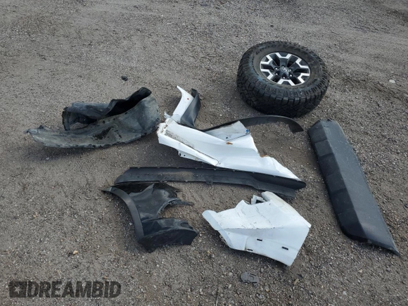 2022 Toyota Tacoma SR с VIN 3TMCZ5AN0NM468020, выставлен на аукционе Copart как лот 58708235 с пробегом 112 523 миль миль и На запчасти • Non repairable. История ставок и продаж доступна на DreamBid. Изображение 12.