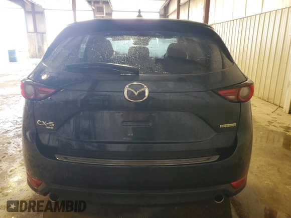 2020 Mazda CX-5 Grand Touring with VIN JM3KFBDM1L0860873, listed as a Copart auction lot 55463335 with 85,810 mi miles and Salvage Title. Bid and sale history available at DreamBid. Image 6.