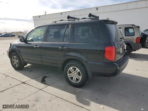 2004 Honda Pilot EX with VIN 5FNYF18684B009407, listed as a Copart auction lot 82195634 with 217,683 mi miles and Salvage Title. Bid and sale history available at carsss.com. Image 2.