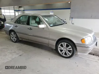1999 Mercedes-Benz C 230/260/280/320 with VIN WDBHA24G7XA740618, listed as a Copart auction lot 78695104 with 144,512 mi miles and Salvage Title. Bid and sale history available at carsss.com. Image 4.