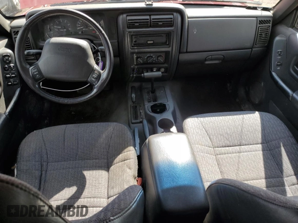 2000 Jeep Cherokee with VIN 1J4FF48S0YL113246, listed as a Copart auction lot 51861455 with 180,965 mi miles and Clean title. Bid and sale history available at DreamBid. Image 8.