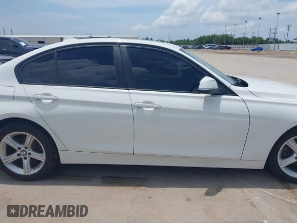 2013 BMW 3 Series 320i with VIN WBA3B1C50DK129576, listed as a IAAI auction lot 42393038 with 160,370 mi miles and . Bid and sale history available at DreamBid. Image 13.