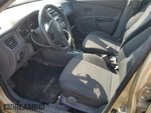 2011 Kia Rio with VIN KNADH4B38B6725531, listed as a Copart auction lot 72389974 with 124,315 mi miles and Salvage Title. Bid and sale history available at DreamBid. Image 7.