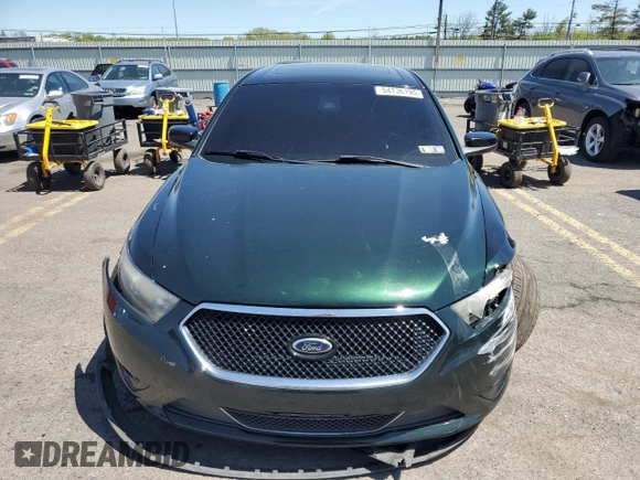 2013 Ford Taurus SHO z VIN 1FAHP2KT8DG173401, wystawiony jako Copart lot #54736195 z przebiegiem 176 507 mil mil oraz Szkoda całkowita • Salvage title. Historia ofert i sprzedaży dostępna na DreamBid. Obrazek 5.