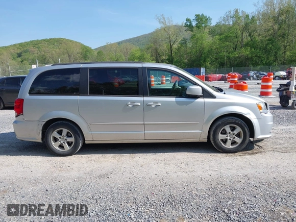 2012 Dodge Grand Caravan SXT with VIN 2C4RDGCG0CR284124, listed as a IAAI auction lot 42103224 with 131,691 mi miles and . Bid and sale history available at DreamBid. Image 13.