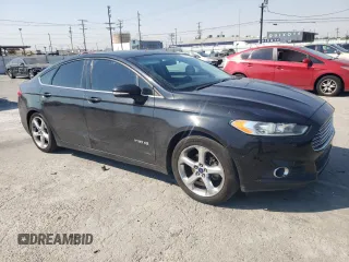2014 Ford Fusion SE Hybrid with VIN 3FA6P0LUXER296906, listed as a Copart auction lot 62265414 with 135,332 mi miles and Salvage title. Bid and sale history available at DreamBid. Image 4.