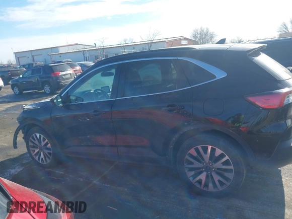 2021 Ford Escape Titanium с VIN 1FMCU9J90MUB23259, выставлен на аукционе IAAI как лот 41535706 с пробегом 100 664 миль миль и . История ставок и продаж доступна на DreamBid. Изображение 14.