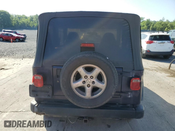 1999 Jeep Wrangler Sport with VIN 1J4FY19S6XP445867, listed as a Copart auction lot 62223125 with 146,037 mi miles and Salvage title. Bid and sale history available at DreamBid. Image 6.