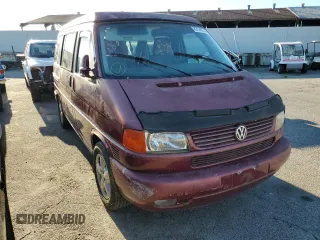 2003 Volkswagen EuroVan MV с VIN WV2NB47013H001081, выставлен на аукционе Copart как лот 82126354 с пробегом 158 433 миль миль и Чистый • Clean title. История ставок и продаж доступна на DreamBid. Изображение 4.
