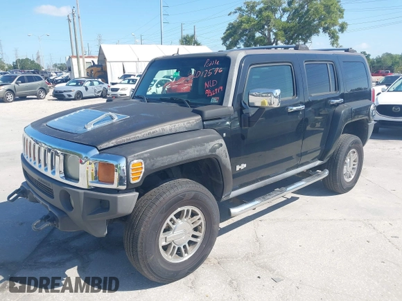 2007 Hummer H3 SUV with VIN 5GTDN13E878233953, listed as a IAAI auction lot 42012596 with 232,919 mi miles. Bid and sale history available at carsss.com. Image 2.