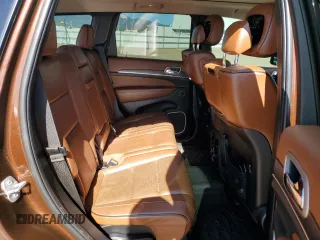 2015 Jeep Grand Cherokee Summit с VIN 1C4RJFJG9FC914516, выставлен на аукционе Copart как лот 57410505 с пробегом 130 350 миль миль и Списание • Salvage title. История ставок и продаж доступна на DreamBid. Изображение 10.