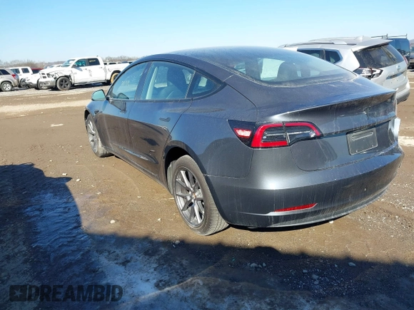 2023 Tesla Model 3 with VIN 5YJ3E1EA9PF548502, listed as a IAAI auction lot 41160649 with 28,759 mi miles and . Bid and sale history available at carsss.com. Image 3.