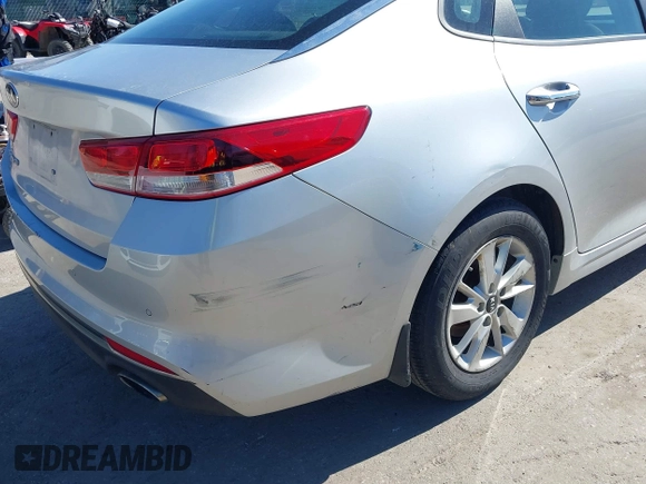 2016 Kia Optima LX with VIN 5XXGT4L37GG084538, listed as a IAAI auction lot 41784807 with 128,928 mi miles. Bid and sale history available at carsss.com. Image 17.