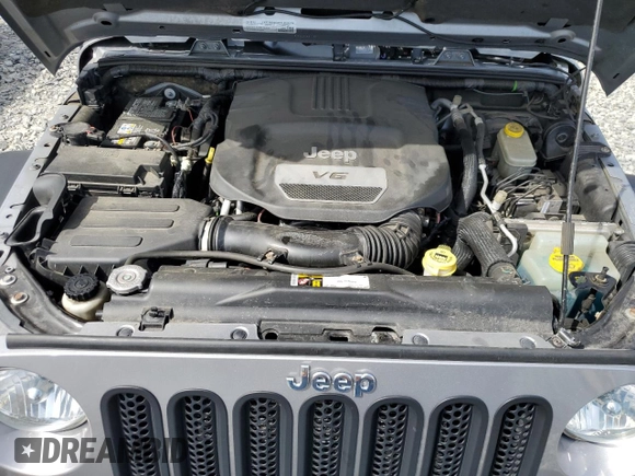 2015 Jeep Wrangler Unlimited Rubicon Hard Rock with VIN 1C4HJWFG4FL575054, listed as a Copart auction lot 51672655 with 130,405 mi miles and Clean title. Bid and sale history available at DreamBid. Image 12.