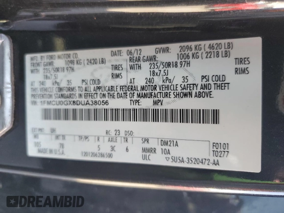 2013 Ford Escape SE with VIN 1FMCU0GX8DUA38056, listed as a Copart auction lot 57617885 with 128,467 mi miles and Salvage title. Bid and sale history available at DreamBid. Image 13.