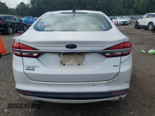 2017 Ford Fusion SE с VIN 3FA6P0H75HR392711, выставлен на аукционе Copart как лот 61758105 с пробегом 166 348 миль миль и Чистый • Clean title. История ставок и продаж доступна на DreamBid. Изображение 6.