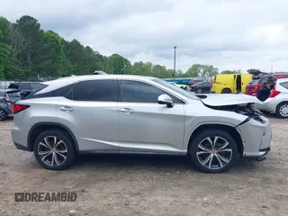 2016 Lexus RX 350 z VIN 2T2ZZMCA5GC002315, wystawiony jako IAAI lot #42107312 z przebiegiem 156 339 mil mil oraz . Historia ofert i sprzedaży dostępna na DreamBid. Obrazek 14.