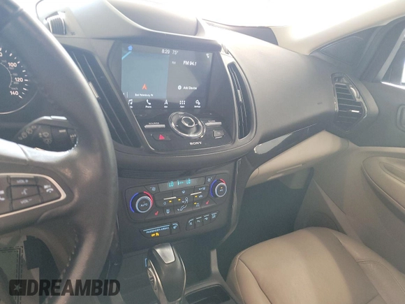 2019 Ford Escape Titanium with VIN 1FMCU9J96KUA01051, listed as a IAAI auction lot 42841649 with 69,720 mi miles and . Bid and sale history available at DreamBid. Image 14.