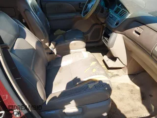 2001 Toyota Sienna LE with VIN 4T3ZF13C61U336492, listed as a IAAI auction lot 41896586 with 191,571 mi miles. Bid and sale history available at carsss.com. Image 5.