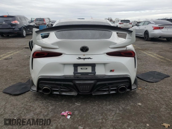 2023 Toyota Supra 3.0 z VIN WZ1DB0G09PW061258, wystawiony jako Copart lot #77875554 z przebiegiem Nie podano mil oraz Szkoda całkowita • Salvage title. Historia ofert i sprzedaży dostępna na DreamBid. Obrazek 6.