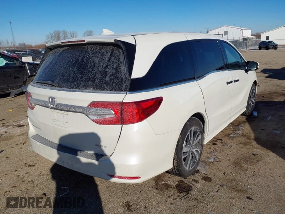 2018 Honda Odyssey Elite with VIN 5FNRL6H97JB039191, listed as a IAAI auction lot 41625687 with 54,363 mi miles and . Bid and sale history available at DreamBid. Image 4.