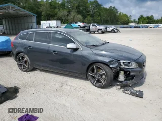 2015 Volvo V60 z VIN YV1902SS6F1227756, wystawiony jako Copart lot #57962725 z przebiegiem 62 542 mil mil oraz Szkoda całkowita • Salvage title. Historia ofert i sprzedaży dostępna na DreamBid. Obrazek 4.