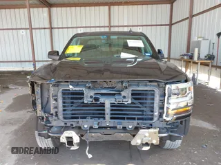 2017 Chevrolet Silverado 1500 LT with VIN 3GCPCREH3HG104014, listed as a IAAI auction lot 41986826 with 58,780 mi miles and . Bid and sale history available at DreamBid. Image 12.