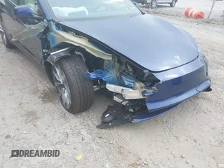 2024 Tesla Model 3 with VIN 5YJ3E1EA0RF769229, listed as a IAAI auction lot 40375043 with Not Provided miles and . Bid and sale history available at DreamBid. Image 6.