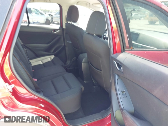 2016 Mazda CX-5 Touring with VIN JM3KE2CY6G0830409, listed as a IAAI auction lot 42049299 with 39,317 mi miles. Bid and sale history available at carsss.com. Image 8.