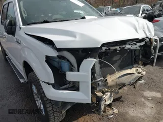 2016 Ford F-150 XLT with VIN 1FTFW1EG9GFC01505, listed as a IAAI auction lot 41534892 with 156,150 mi miles. Bid and sale history available at carsss.com. Image 6.