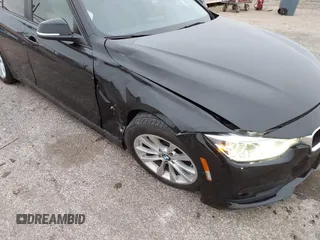 2018 BMW 3 Series 320i with VIN WBA8E1G56JNU91008, listed as a IAAI auction lot 41247490 with 57,434 mi miles. Bid and sale history available at carsss.com. Image 6.