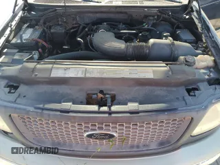 2000 Ford F-150 XL with VIN 1FTRX18L0YNB65908, listed as a Copart auction lot 54797585 with 298,924 mi miles and Clean title. Bid and sale history available at DreamBid. Image 11.