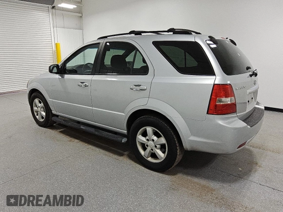 2007 Kia Sorento LX z VIN KNDJD736075700860, wystawiony jako Copart lot #82119114 z przebiegiem 290 641 mil mil oraz Czysty tytuł • Clean title. Historia ofert i sprzedaży dostępna na DreamBid. Obrazek 2.