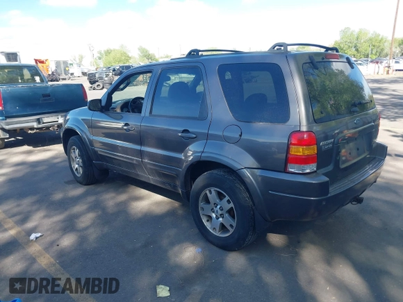 2003 Ford Escape Limited with VIN 1FMCU94173KB02067, listed as a IAAI auction lot 42088659 with 236,209 mi miles. Bid and sale history available at carsss.com. Image 3.