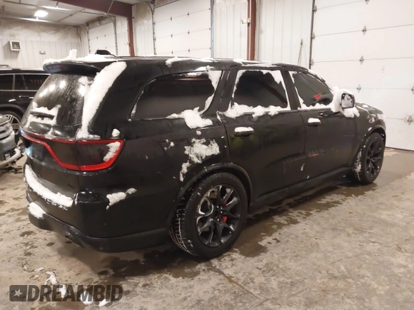 2021 Dodge Durango R/T z VIN 1C4SDJCT6MC556598, wystawiony jako IAAI lot #41545122 z przebiegiem 40 654 mil mil oraz . Historia ofert i sprzedaży dostępna na DreamBid. Obrazek 4.
