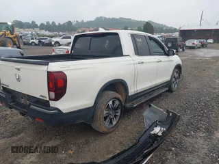2018 Honda Ridgeline RTL-E with VIN 5FPYK3F77JB017293, listed as a IAAI auction lot 42422614 with 87,700 mi miles and . Bid and sale history available at DreamBid. Image 4.