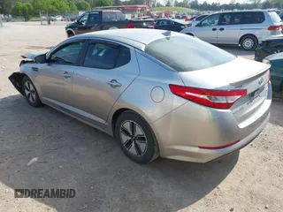 2012 Kia Optima Hybrid with VIN KNAGM4AD9C5020070, listed as a IAAI auction lot 41952137 with 153,942 mi miles. Bid and sale history available at carsss.com. Image 3.