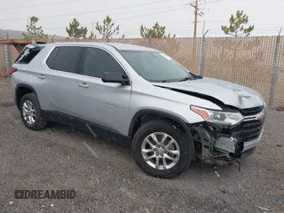 2018 Chevrolet Traverse LS z VIN 1GNERFKW2JJ242503, wystawiony jako IAAI lot #41720359 z przebiegiem 84 087 mil mil oraz . Historia ofert i sprzedaży dostępna na DreamBid. Obrazek 1.