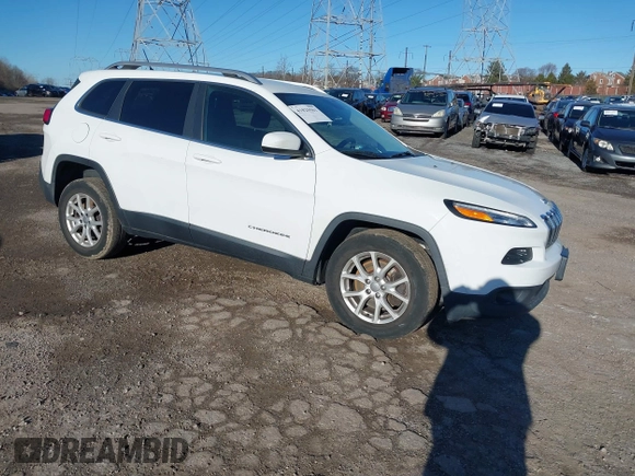 2015 Jeep Cherokee Latitude with VIN 1C4PJMCB3FW734573, listed as a IAAI auction lot 41825561 with 141,250 mi miles. Bid and sale history available at carsss.com. Image 1.