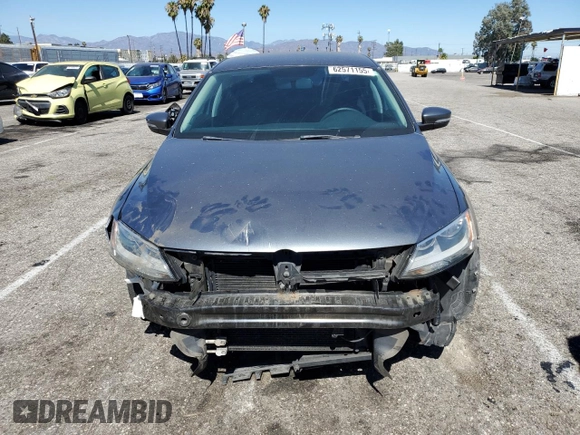 2014 Volkswagen Jetta SE with VIN 3VWD17AJ2EM322087, listed as a Copart auction lot 62571155 with 71,884 mi miles and Salvage title. Bid and sale history available at DreamBid. Image 5.