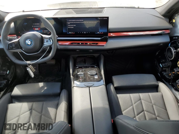 2024 BMW i5 eDrive40 with VIN WBY33FK05RCR50188, listed as a Copart auction lot 52953195 with 423 mi miles and Salvage title. Bid and sale history available at DreamBid. Image 8.