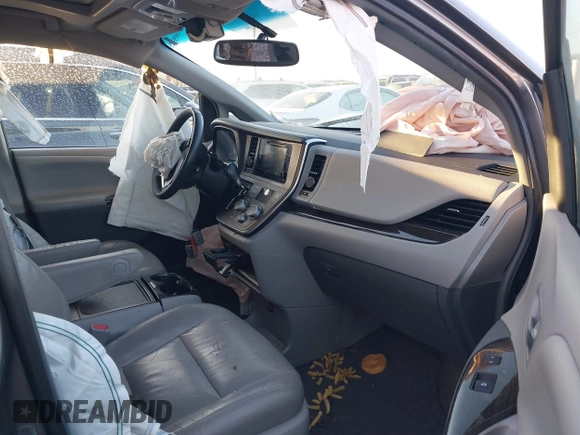 2017 Toyota Sienna XLE Auto Access Seat with VIN 5TDYZ3DC3HS880828, listed as a IAAI auction lot 41609436 with 106,855 mi miles and . Bid and sale history available at DreamBid. Image 5.
