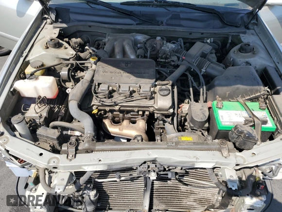 2000 Toyota Camry LE z VIN JT2BF28K5Y0261315, wystawiony jako Copart lot #59607935 z przebiegiem 87 184 mil mil oraz Szkoda całkowita • Salvage title. Historia ofert i sprzedaży dostępna na DreamBid. Obrazek 11.