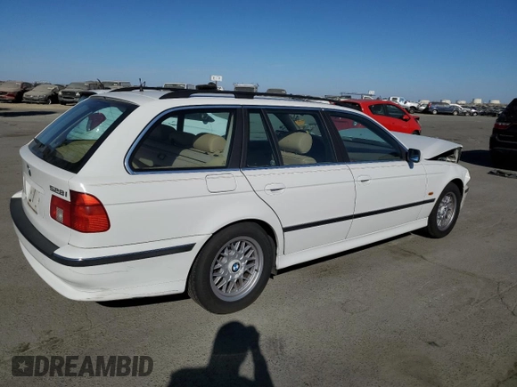 1999 BMW 5 Series 528iAt with VIN WBADP6330XBV61784, listed as a Copart auction lot 77685734 with 210,383 mi miles and Salvage Title. Bid and sale history available at carsss.com. Image 3.