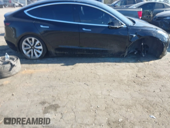 2020 Tesla Model 3 Standard Range Plus with VIN 5YJ3E1EA0LF660759, listed as a IAAI auction lot 41505250 with 63,322 mi miles and . Bid and sale history available at DreamBid. Image 13.