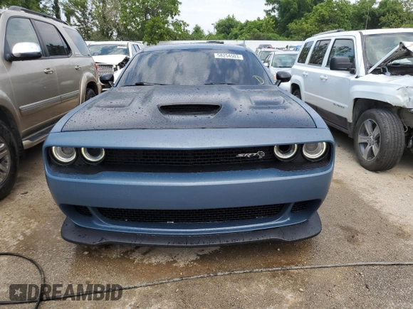 2016 Dodge Challenger z VIN 2C3CD2FJ0GH283337, wystawiony jako Copart lot #58254503 z przebiegiem 63 314 mil mil oraz Czysty tytuł • Clean title. Historia ofert i sprzedaży dostępna na DreamBid. Obrazek 5.