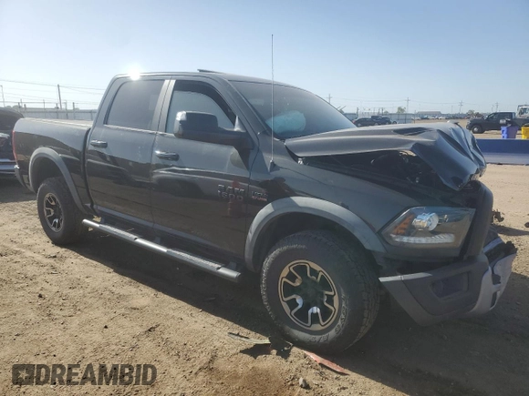 2017 Ram 1500 Rebel z VIN 1C6RR7YT3HS589170, wystawiony jako Copart lot #57115335 z przebiegiem 53 389 mil mil oraz Szkoda całkowita • Salvage title. Historia ofert i sprzedaży dostępna na DreamBid. Obrazek 4.